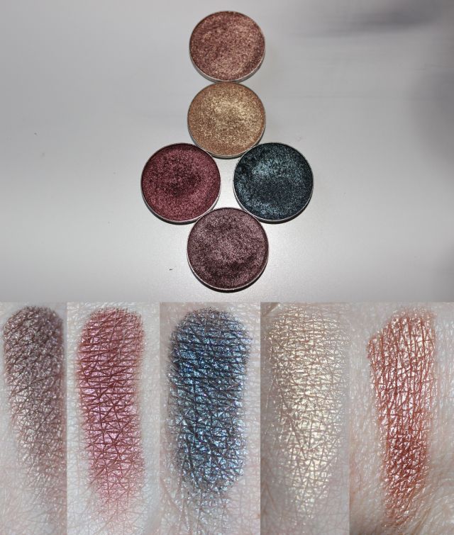 Makeup Geek Foiled Shadow in (Left to Right, Bottom to Top): Mesmerized, Showtime, Houdini, Magic Act, Grandstand