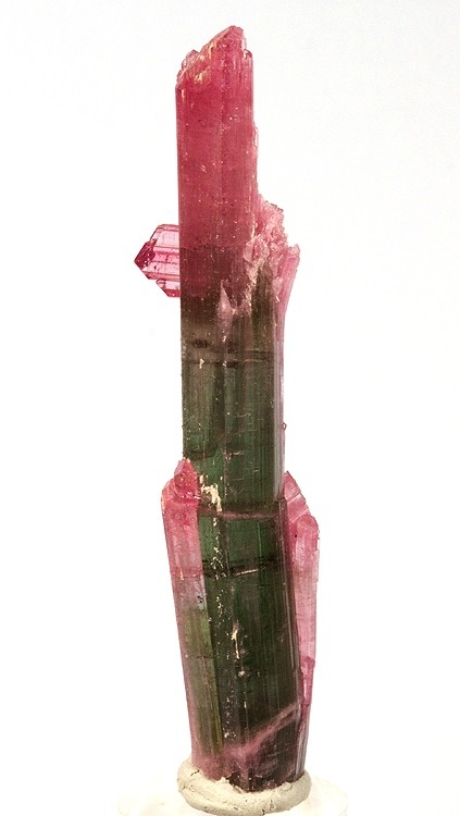 https://upload.wikimedia.org/wikipedia/commons/9/9b/Elbaite-234886.jpg,  By Rob Lavinsky, iRocks.com – CC-BY-SA-3. via Wikimedia Commons